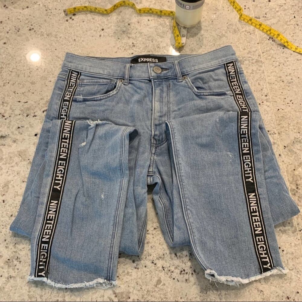 Express nineteen eighty‎ stripe light blue distressed jeans. Size 4